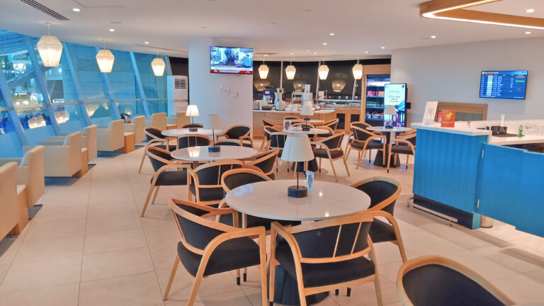 a room with tables and chairs