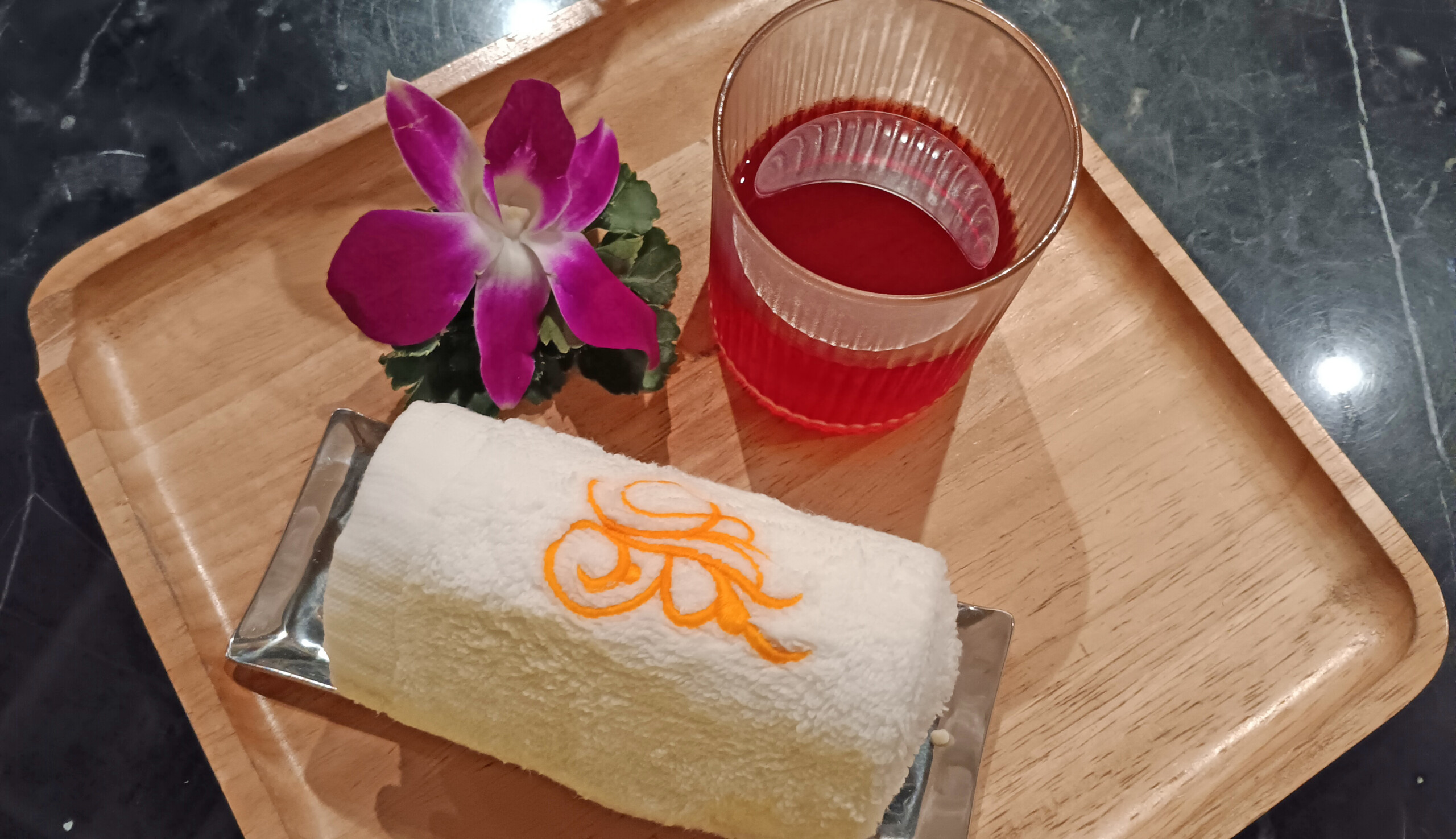 Welcome towel and drink