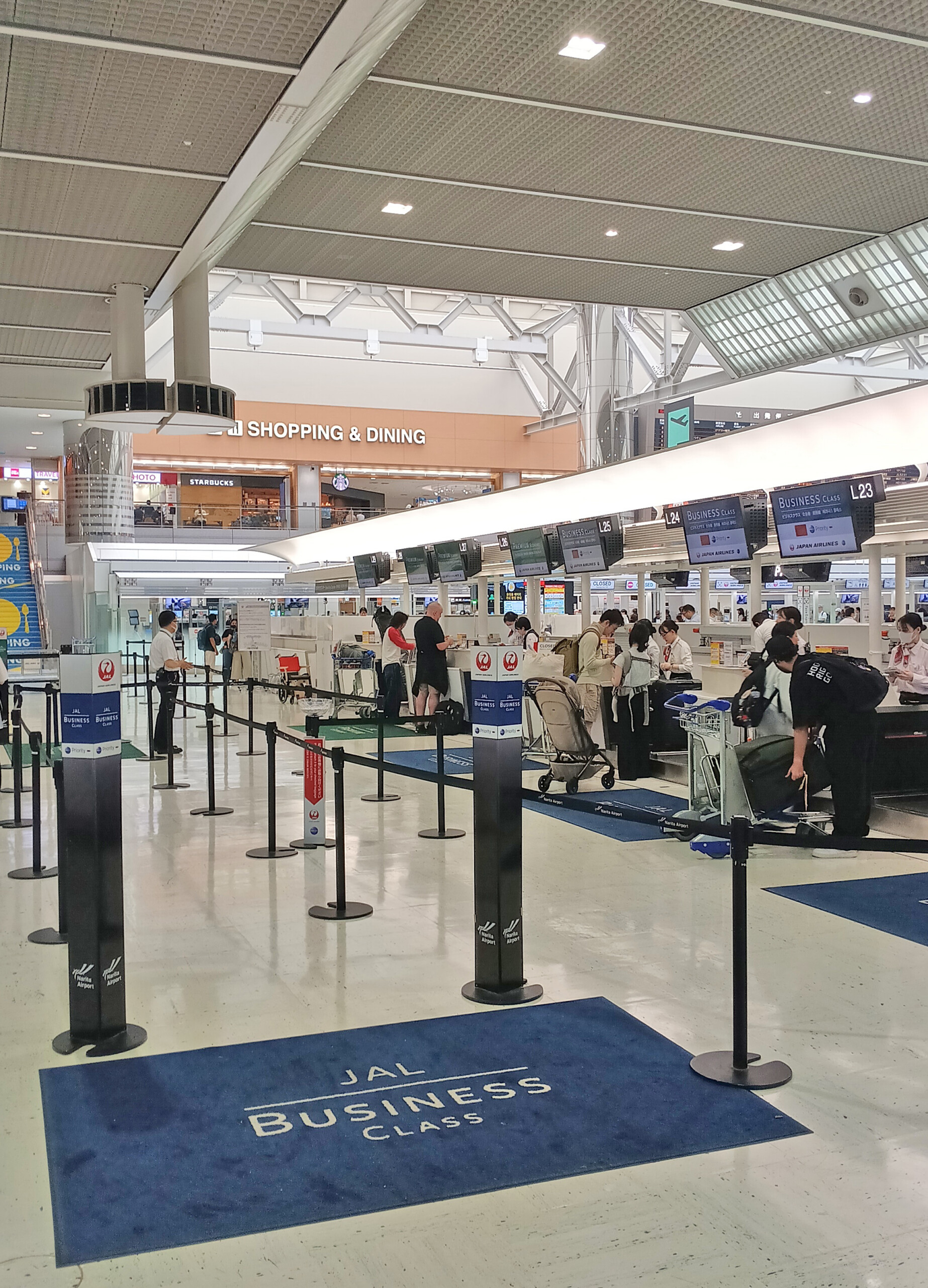 Japan Airlines business class check-in Tokyo Narita