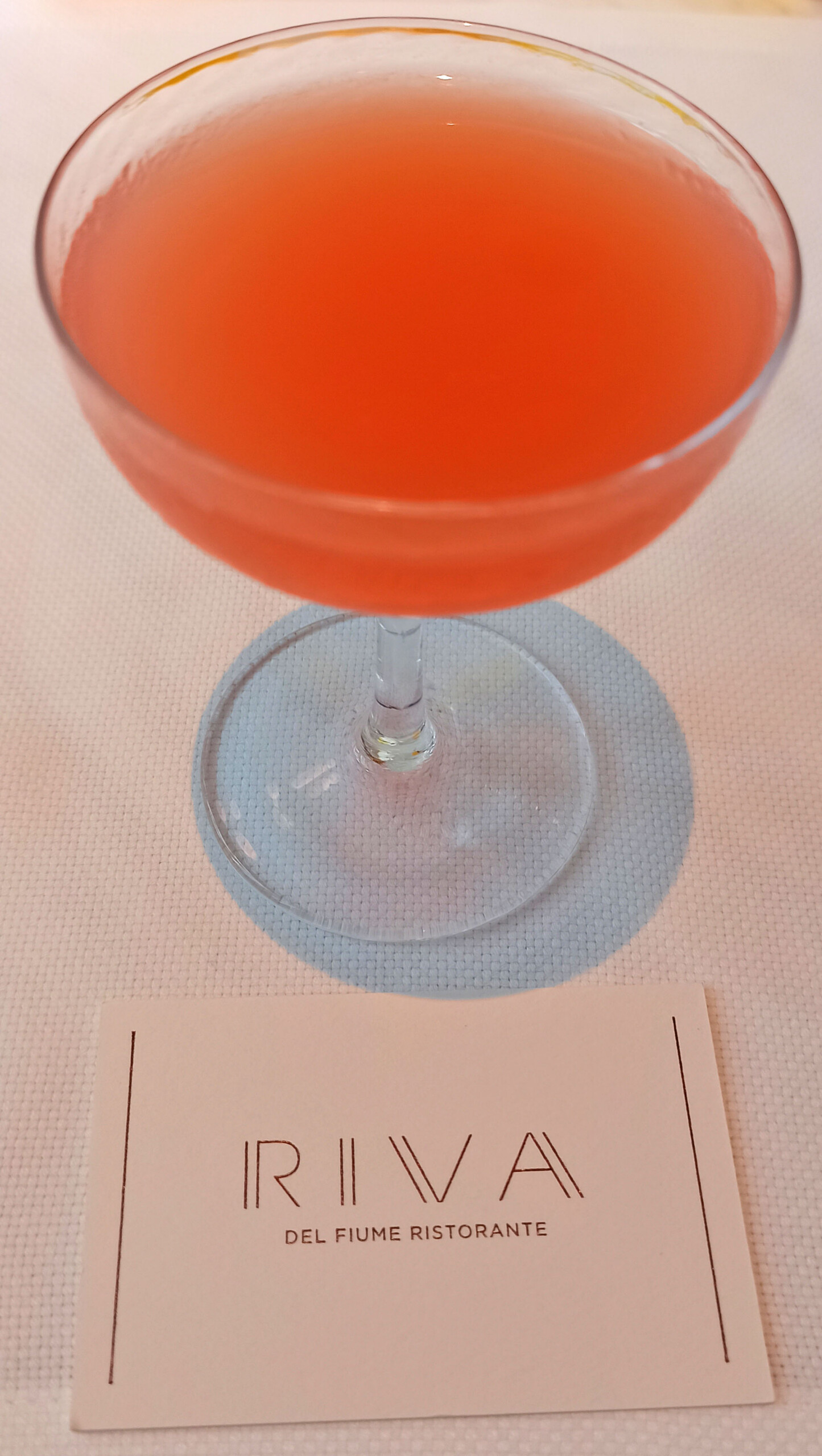 Welcome drink: peach, sparkling water, gin and tangerine