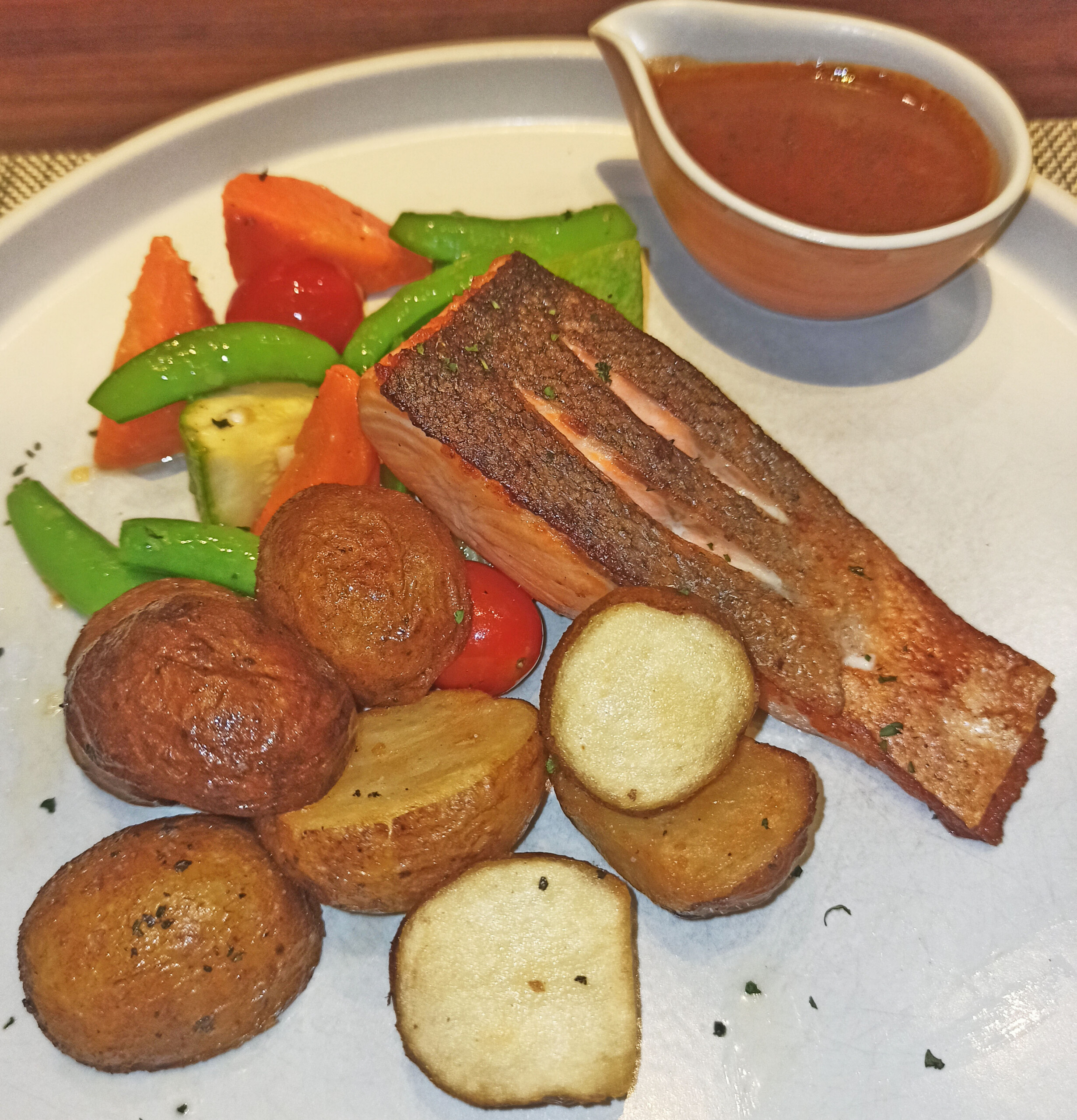 Norwegian salmon with green peppercorn sauce
