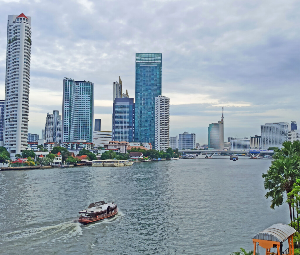 Shuttle boat heading to BTS Saphan Taksin; view is from the pool