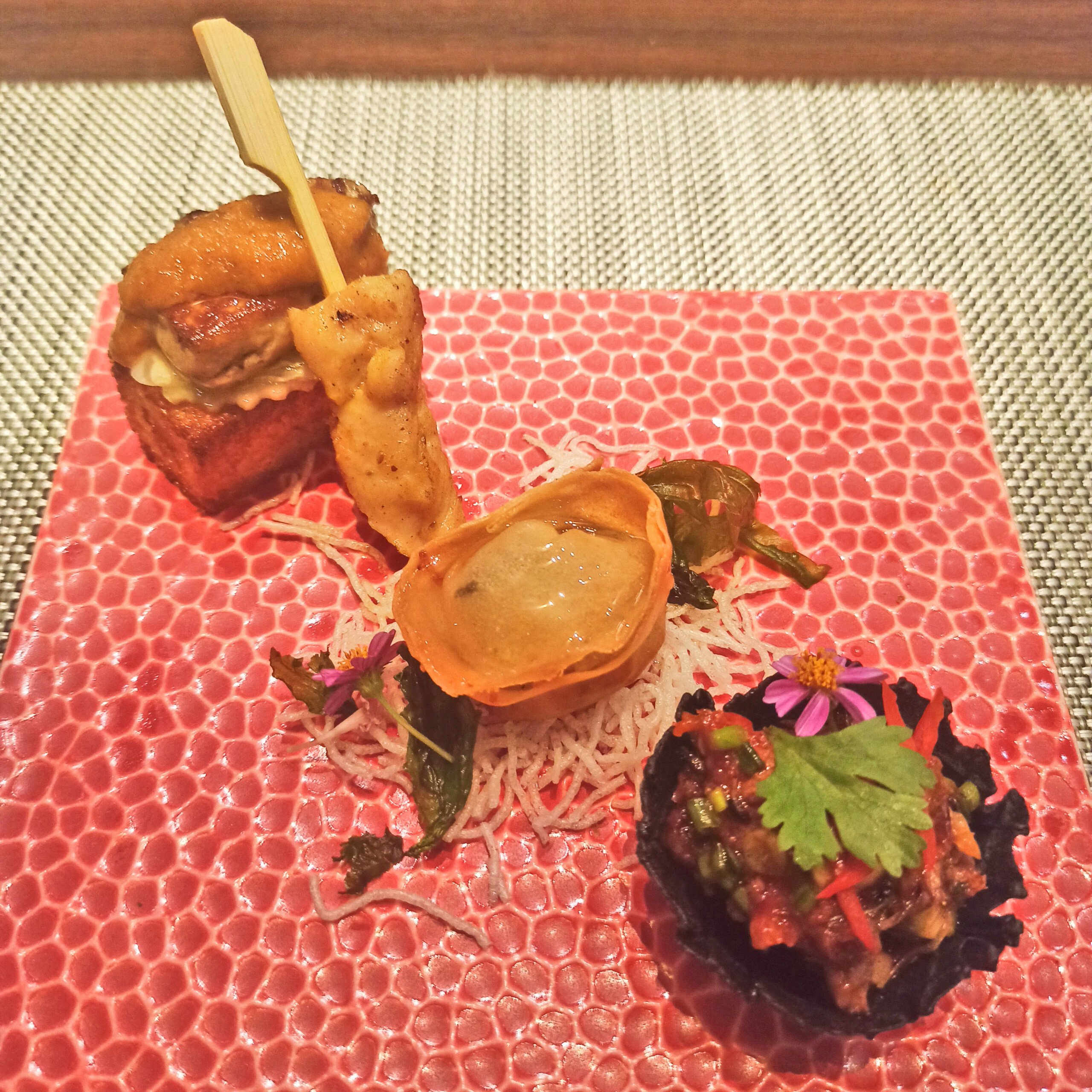 Wagyu Beef in Spicy Lime and Herb Dressing US Scallop Spring Rolls with Sweet Chilli Emulsion Chicken Satay with Spicy Peanut Sauce and Foie Gras Toast